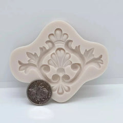 SINGLE PALM CENTER WITH SCROLL BORDER MOULD