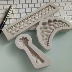 FABRIC DRAPE TUSSLE WITH FLOWER MOULD