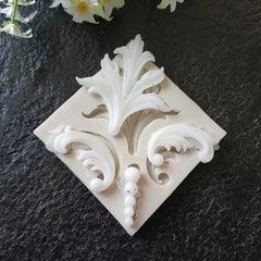 FLOWER AND SCROLL MOULD