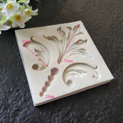 FLOWER AND SCROLL MOULD
