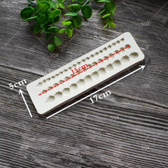 CONTINUOUS SHELL BORDER MOULD