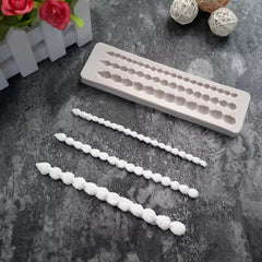 CONTINUOUS SHELL BORDER MOULD