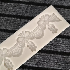 LACE DRAPE WITH BEAD TUSSLES BORDER MOULD