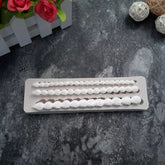 CONTINUOUS SHELL BORDER MOULD