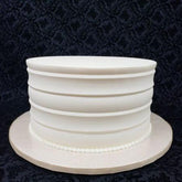 TALL CROWN SCRAPER/ICING COMB (10*4")