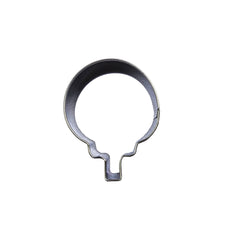 Metallic cookie cutter shaped like a golf ball on a tee